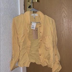 Yellow button up shirt, never worn.